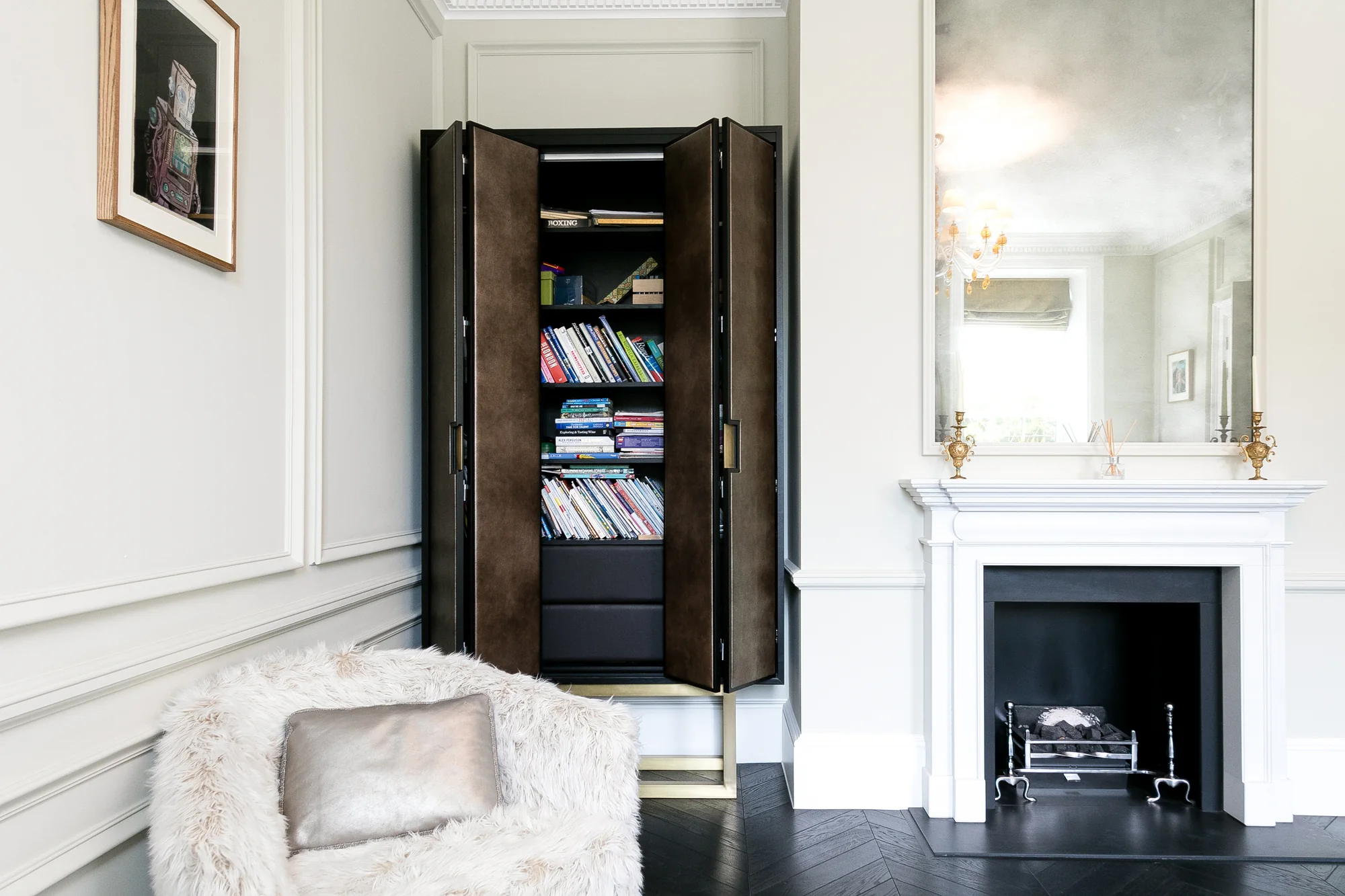 Open cabinet showing concealed shelving