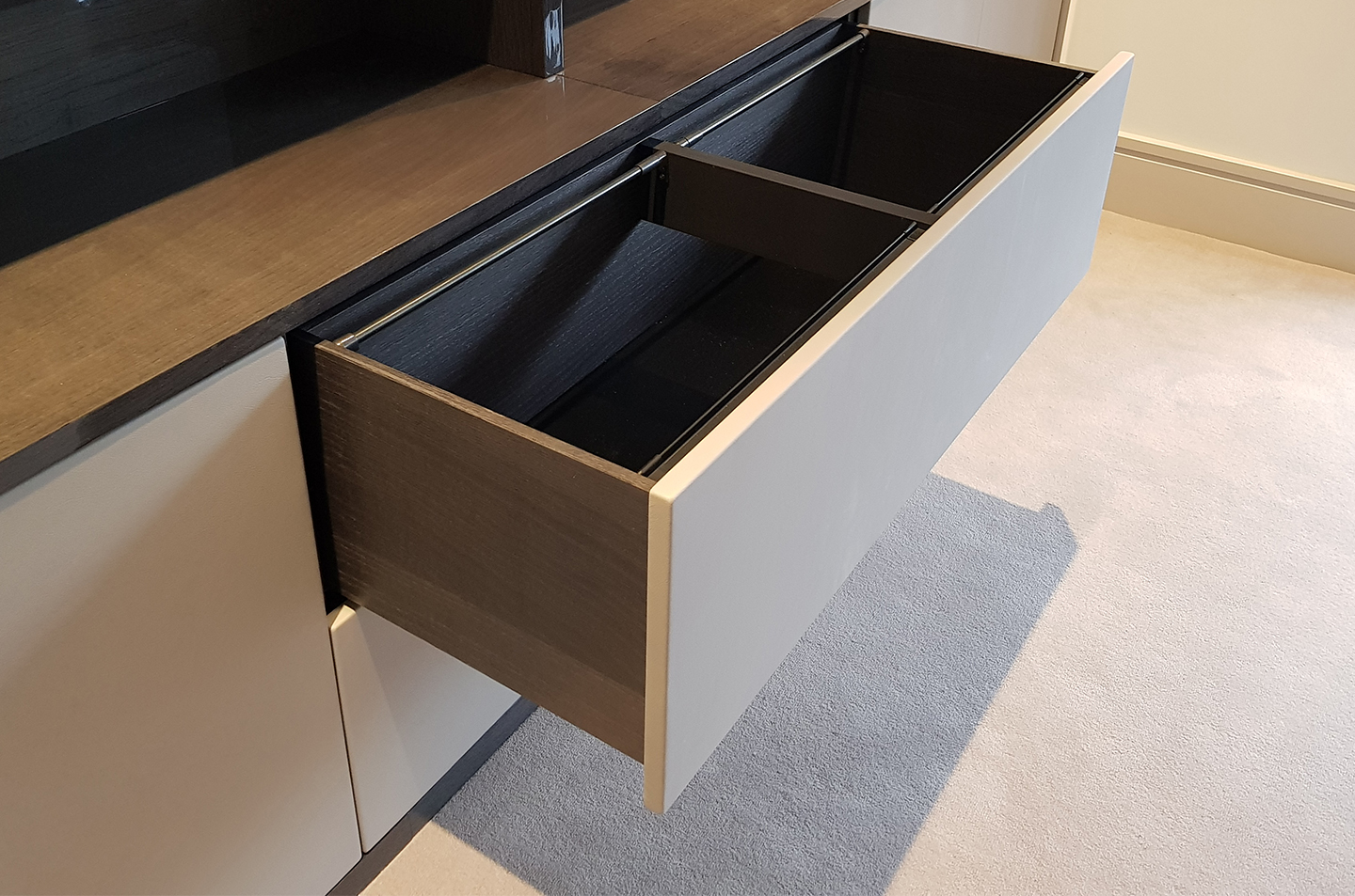 Open drawer with divided storage