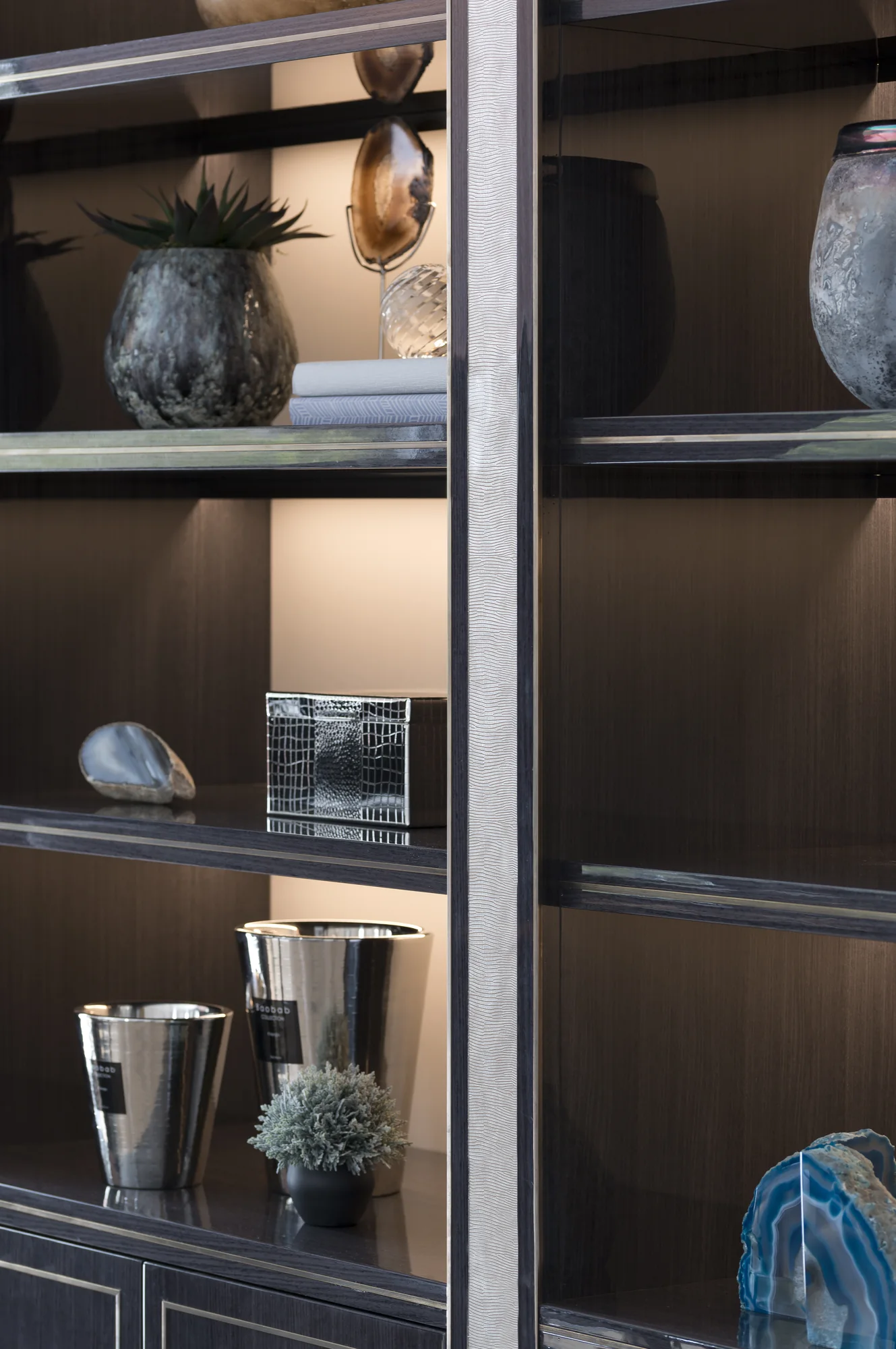 Leather and illuminated shelf detail