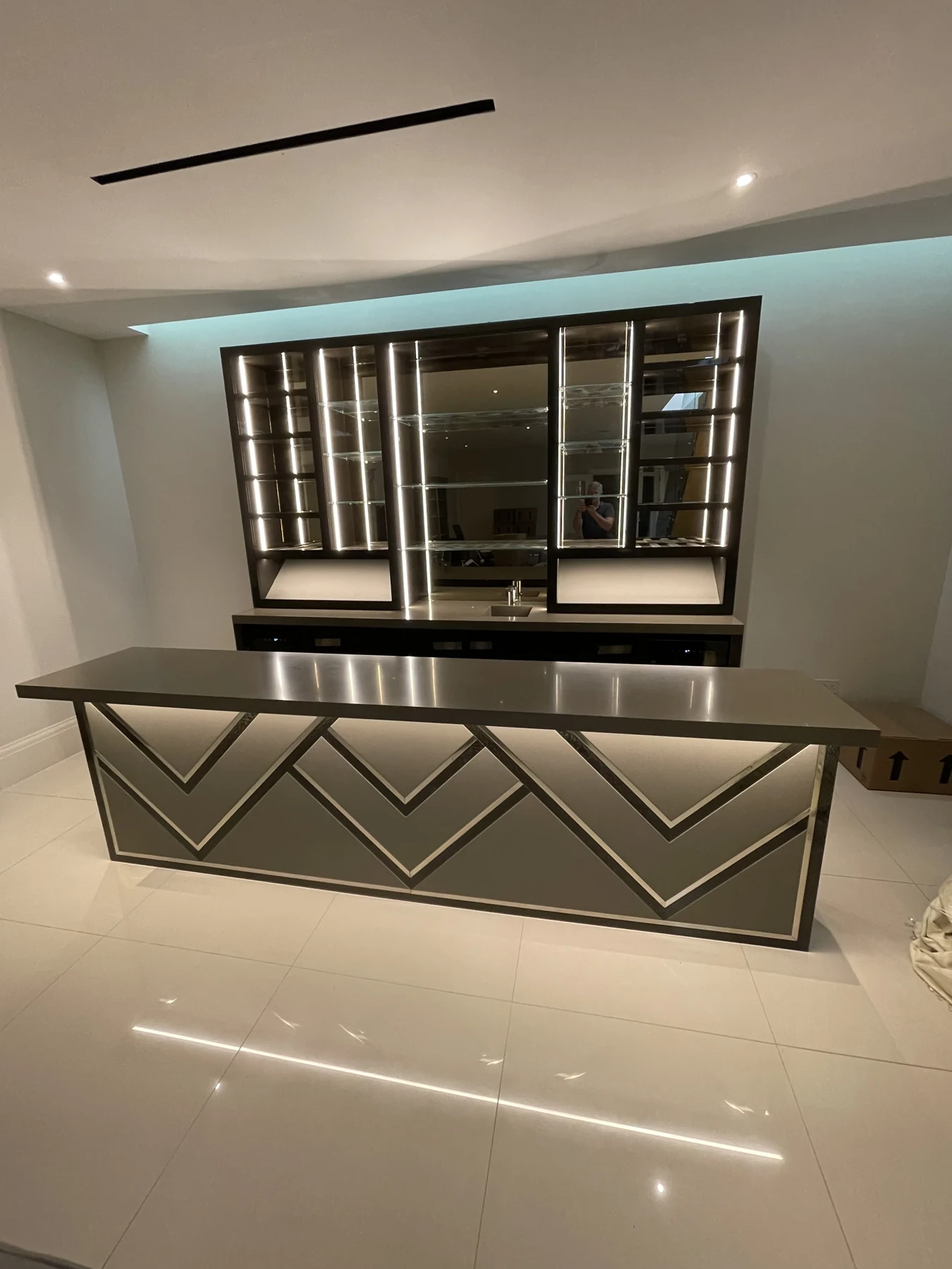 closer view of the chevron-front bar and illuminated back-bar display.