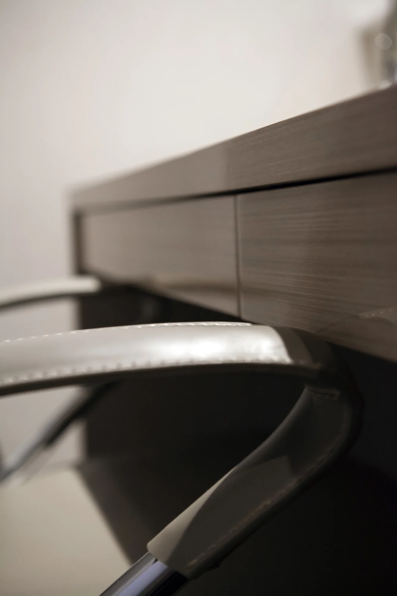 Close view of the fitted desk drawer front and chair