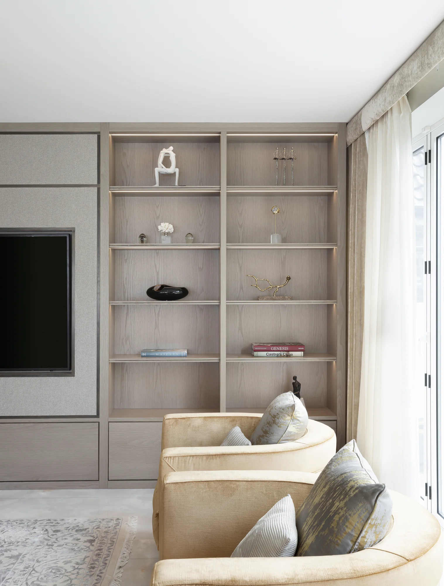 Display shelving beside integrated television