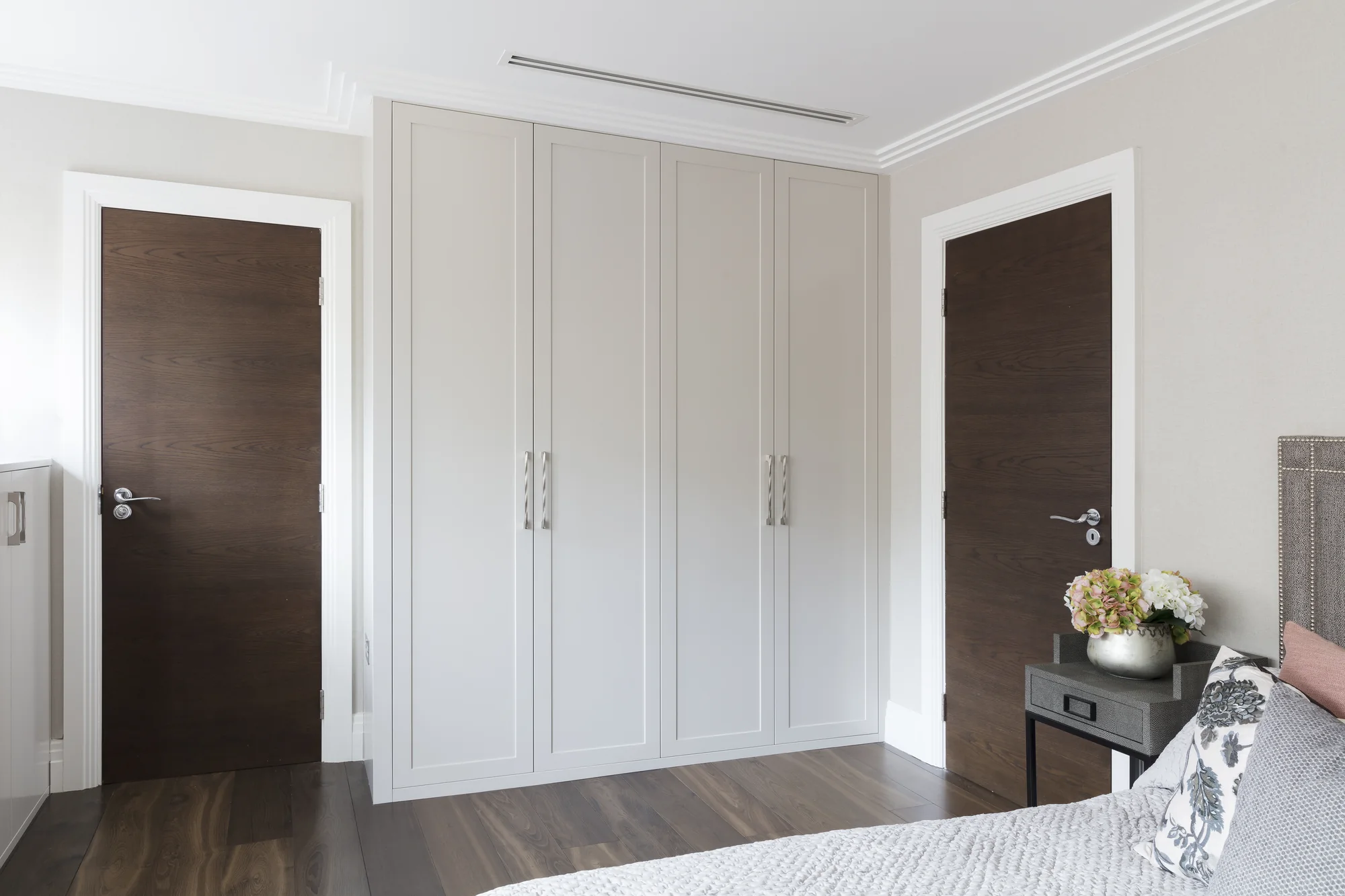 Closed doors on the full-height fitted wardrobe