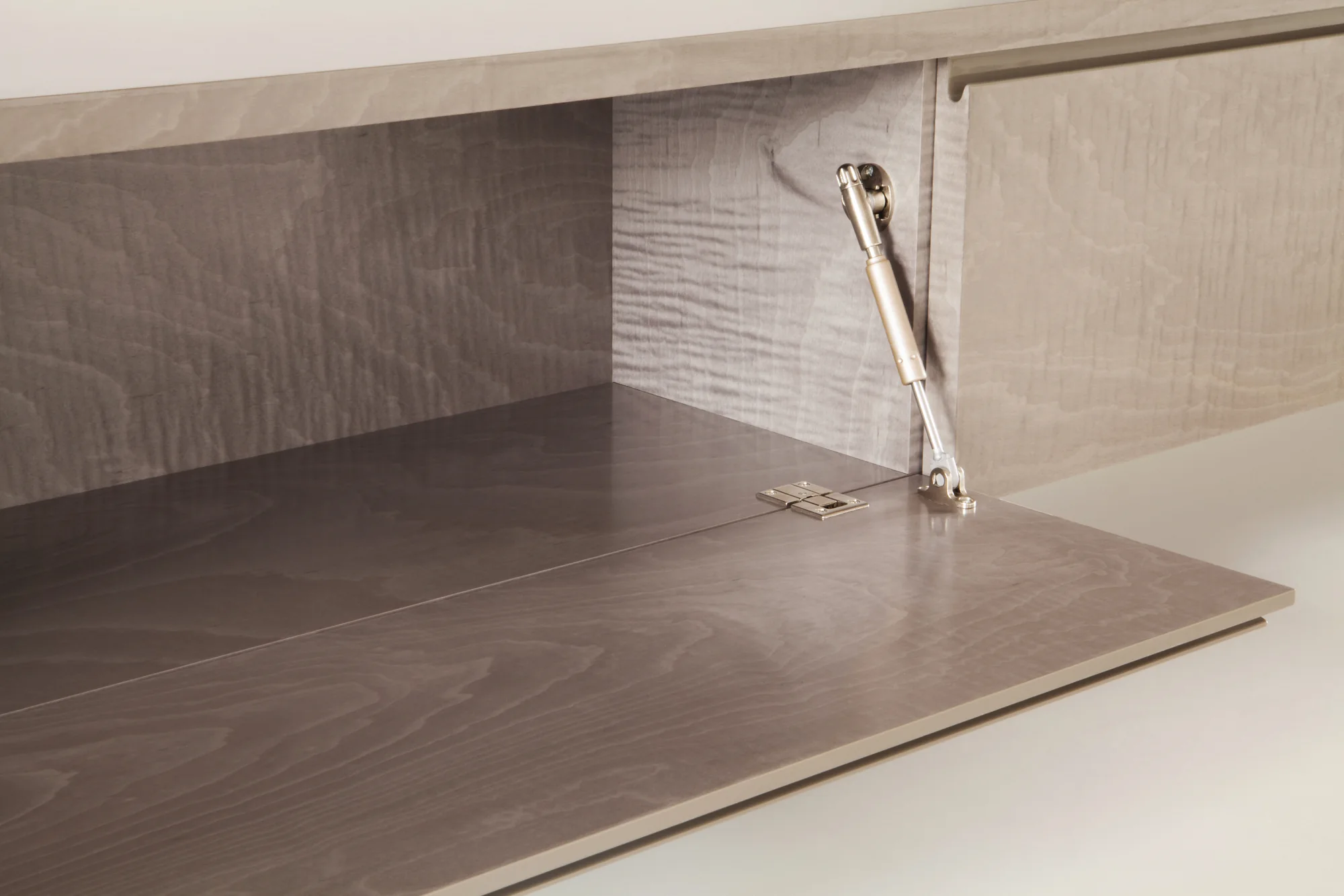 Open concealed storage in media unit