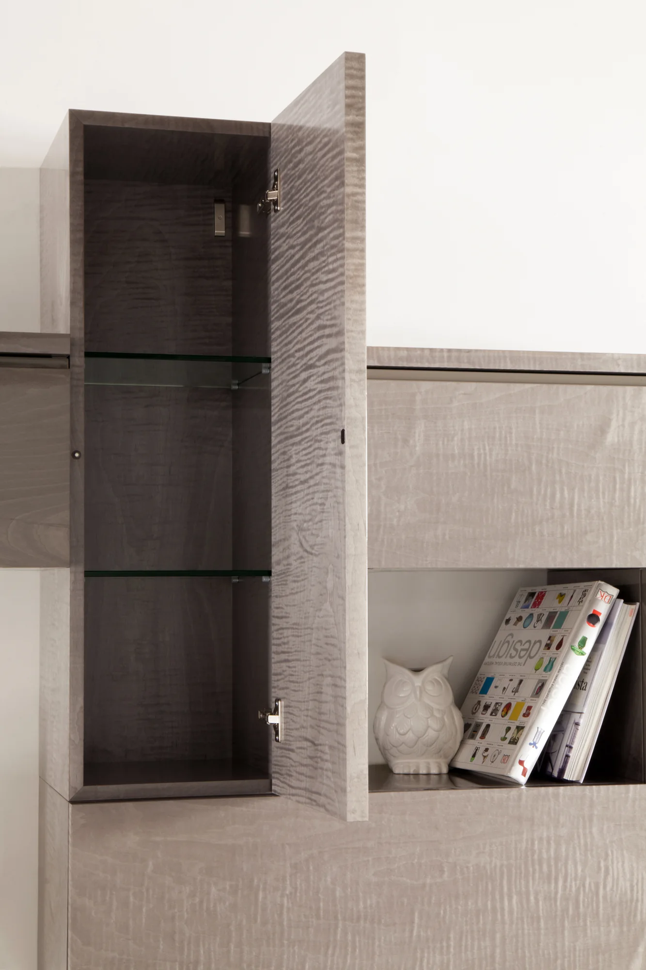 Tall cabinet storage detail within media composition