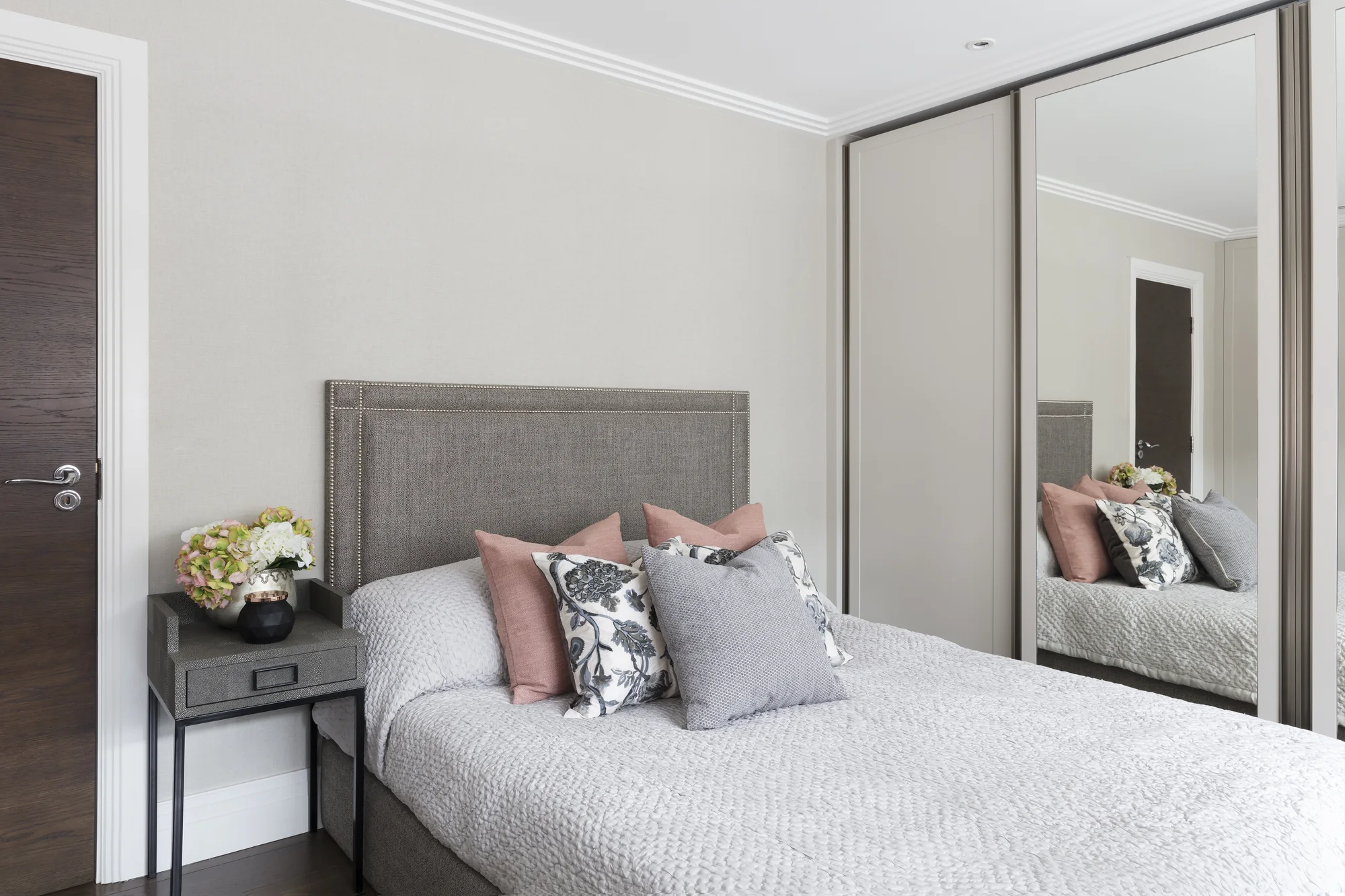 Front view of mirrored wardrobes