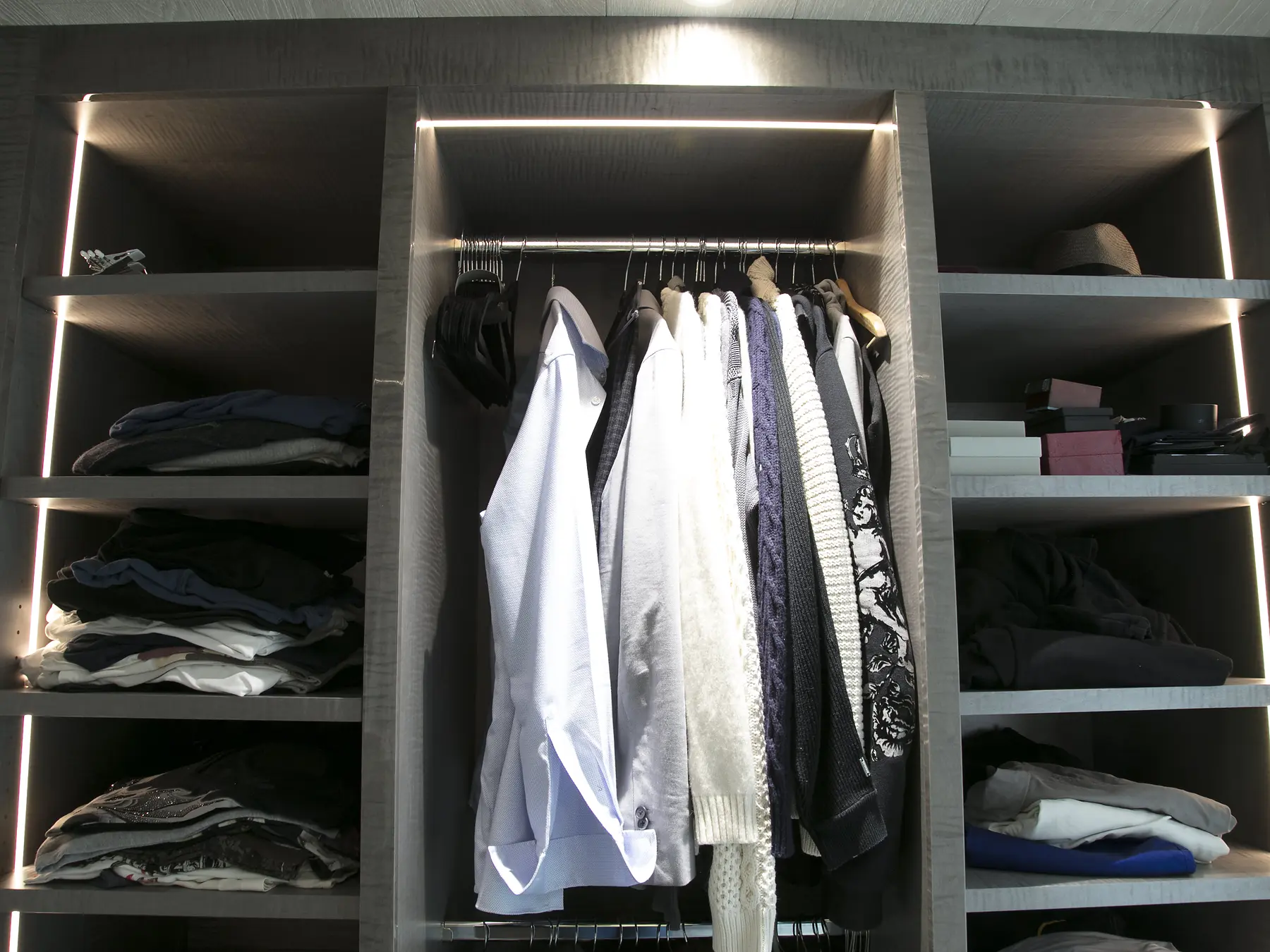 Illuminated walk-in wardrobe storage